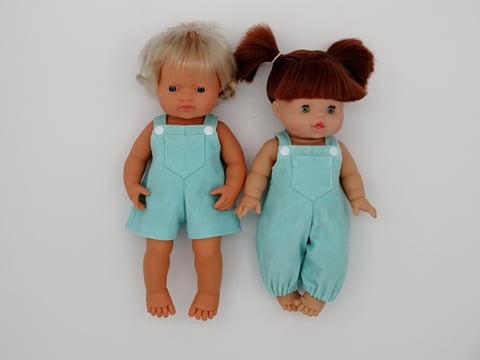 Miniland doll and Minikane doll dressed in handmade dungarees