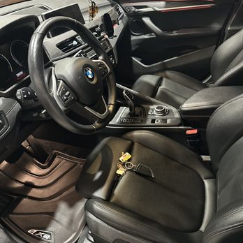 Interior Detailing Image “Deep interior car detailing with steam cleaning and vacuuming of seats"