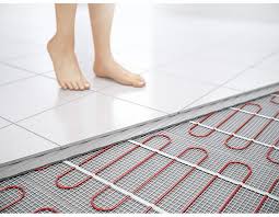 legs on tiled floor over underfloor heating pipes