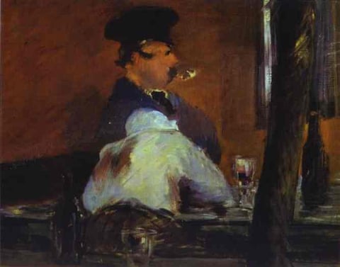 a man smoking a cigarette in a bar