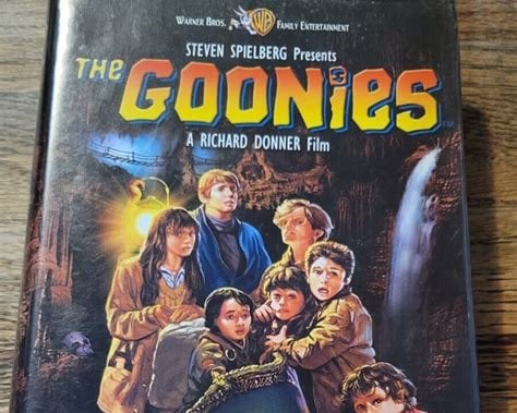 Alt text: Sealed vintage VHS of The Goonies, a classic 80s adventure film.