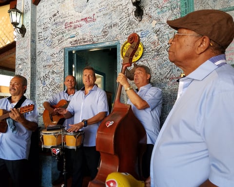 A Cuban band entertains at lunch in Havana, Cuba