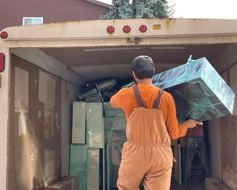 Best affordable reliable movers in Edmonton lifting and packing truck