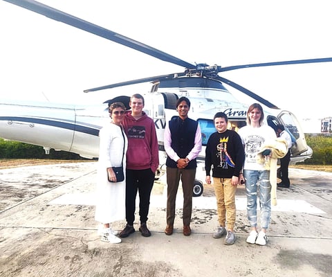 Muzammil (in the center) leading an exotic tour of Agra and Jaipur for a family travelling on their Private Jet