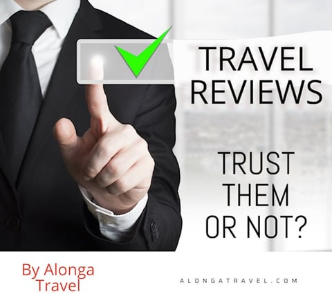 A man writing a review & a custom sign 'travel reviews; trust them or not'