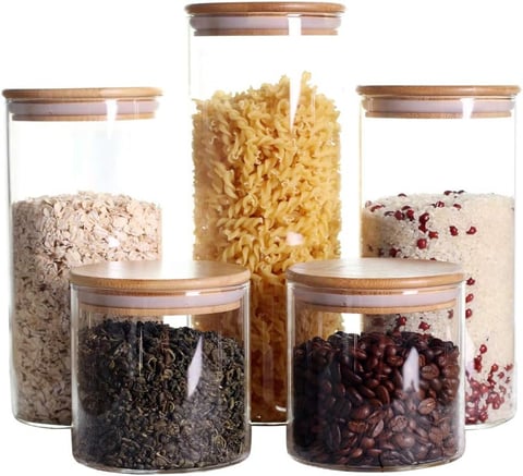 a variety of food items in a glass jar