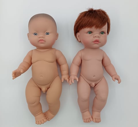 Minikane doll compared to Lille Love doll