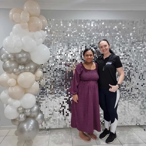 Carly with Denise's sister who organised the silver shimmer wall for her graduation, Brisbane.