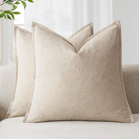 a couch with pillows and pillows on it