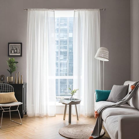 a living room with a couch and a chair