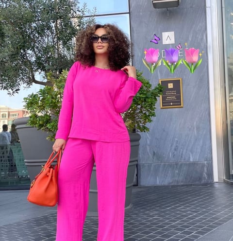 Nadia Buari in a pink dress.