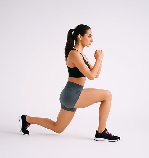 a woman doing step-back lunges