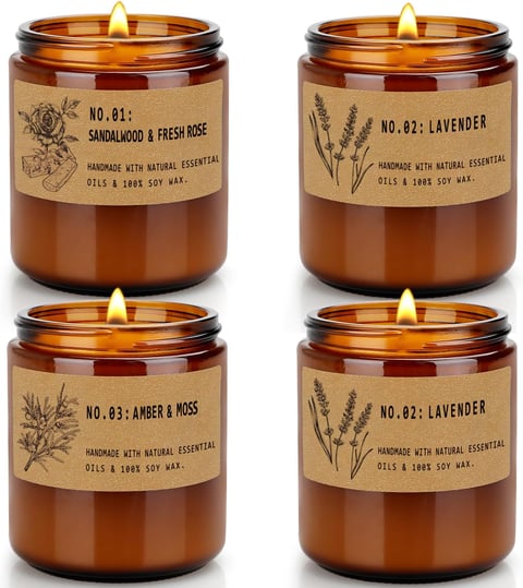a set of four candles with labels on them