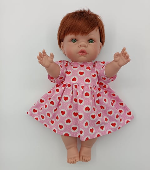 Lille Love doll dressed in pink heart dress made for Minikane doll