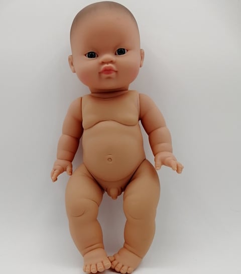 Minikane boy doll standing