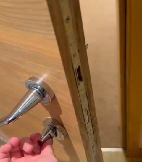 hamdyman fixing the door