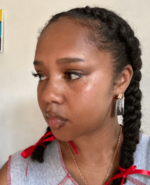 middle part two braids hairstyle