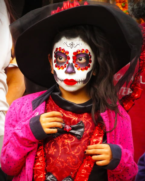 a woman in a costume with a hat and a hat