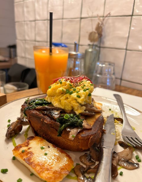 a plate of food with a fork and knife on it