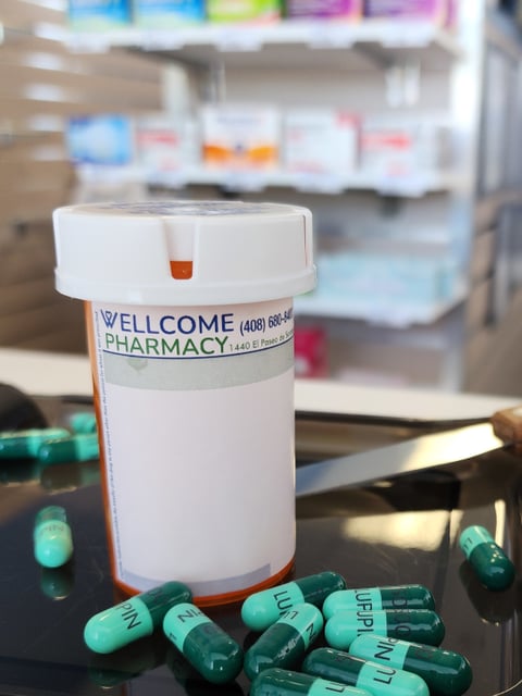 Wellcome Pharmacy prescription vial