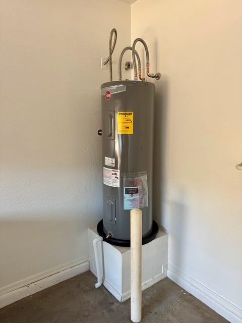 New water heater with drywall repairs
