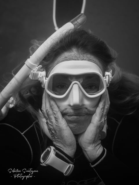 an underwater freediver portrait. Photo taken by Sébastien Saintignan