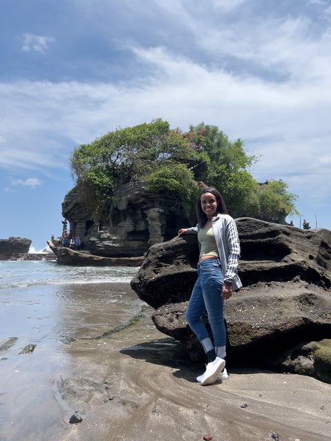 Tanah Lot temple, perched on a rock formation surrounded by the ocean