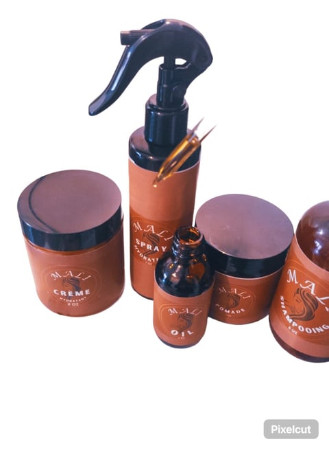 a variety of cosmetics products including a spray bottle and a spray bottle
