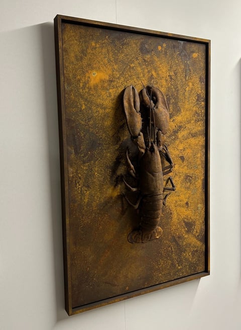 a lobster and crabfish sculpture on display in a museum