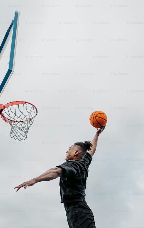 Player trying to dunk the basketball