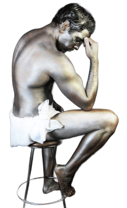 male-seated-on-barstool