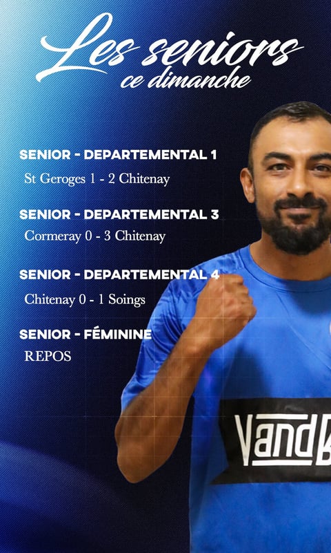 a man in a blue shirt is holding a tennis racket
