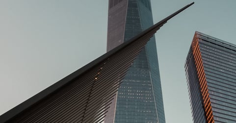 a building with a very tall tower in the background