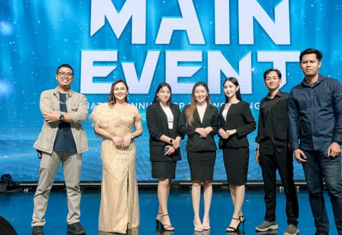 a group of people standing on a stage