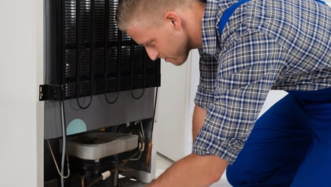 a man in a blue overalls and a blue overall overalls, a blue