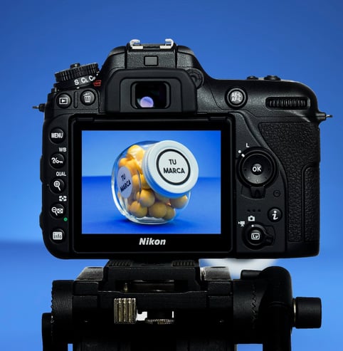 DSLR camera in blue background