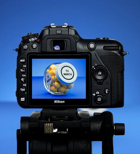 DSLR camera in blue background