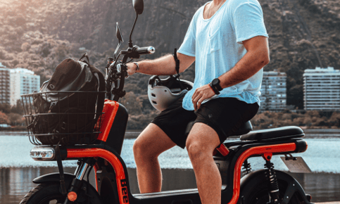 a man riding a e bike