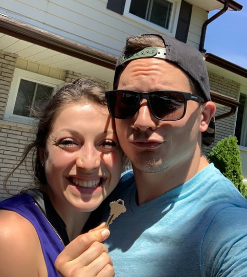 Nicola and Ben, the founders of Path2Own, celebrating as they purchase their first home together,.