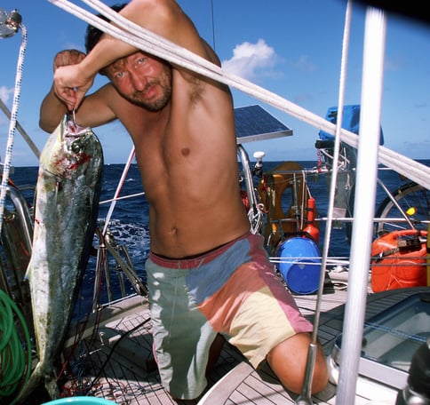 Jan Larsson on his boat with a big fish