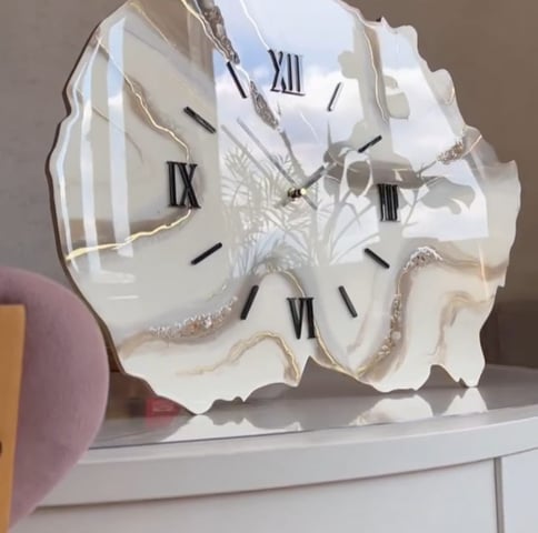 a clock on a table with a clock on it