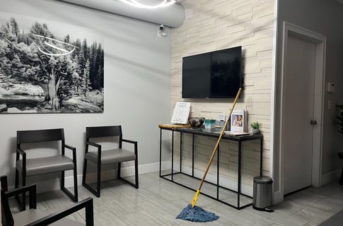 a clean office with a mop