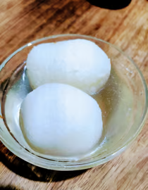 rasgulloa white colour dessert made of milk product and sugar syrup