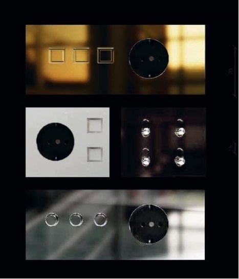 Catálogo de acabados para mecanismos eléctricos con muestras metálicas, negras y doradas