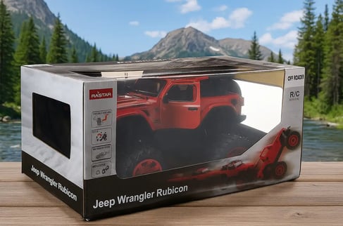 Jeep Rubicon en caja con fondo de montañas