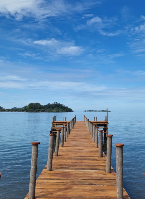 Jetty overlooking Pasumpahan island in Sungai Pisang, West Sumatra