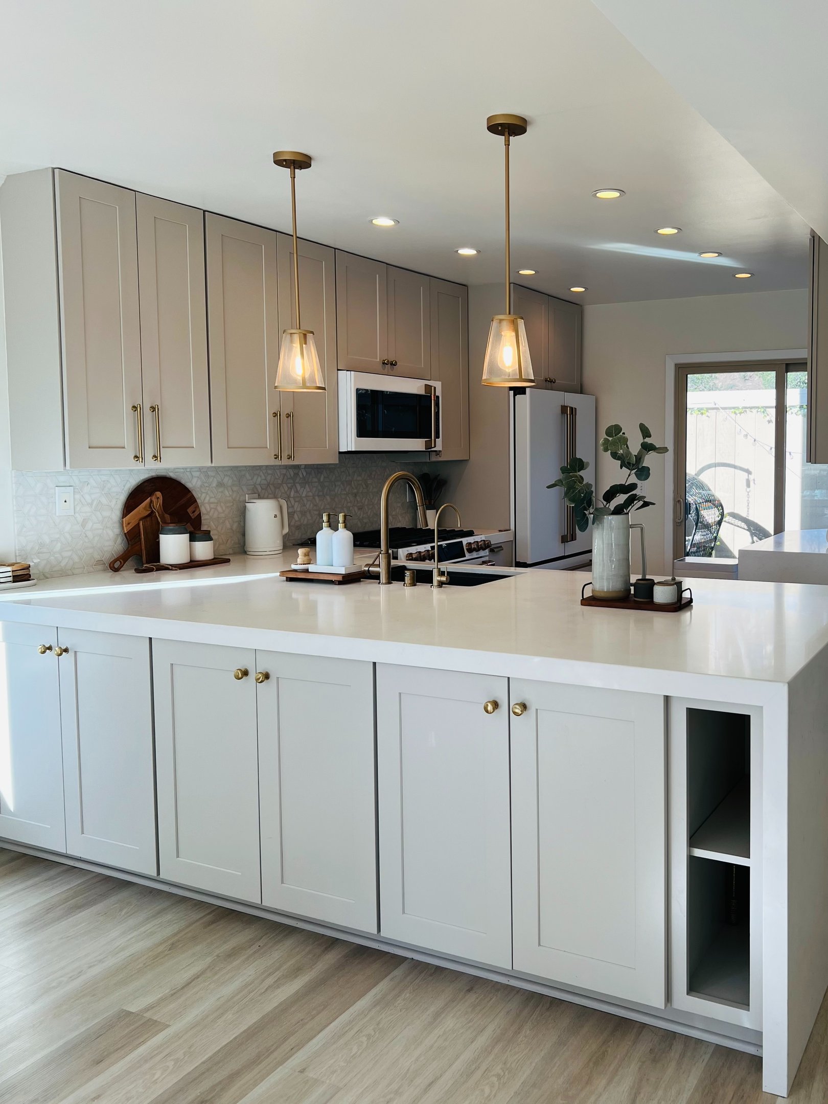 modern kitchen transformation with marble and quartz