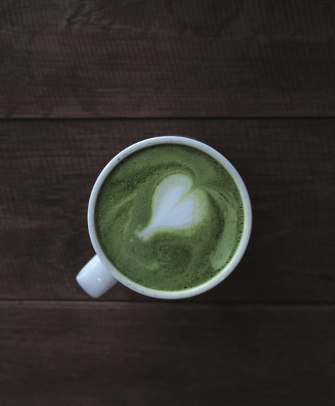 Top down view of Matcha grren tea in a cup