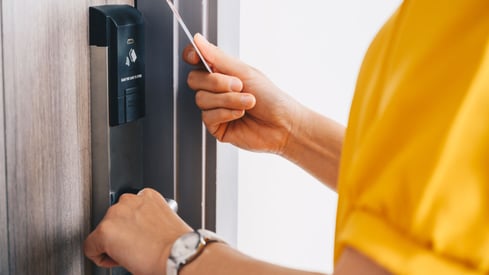 a person fixing their home smart lock