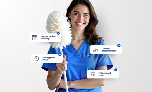 Professional home cleaner in blue scrubs disinfecting a modern kitchen with a spotless finish.